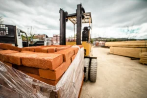 Yellow forklift loading=