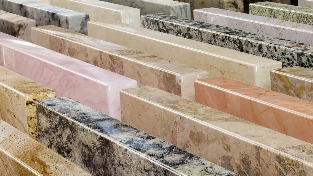 Various polished granite and marble countertop slabs
